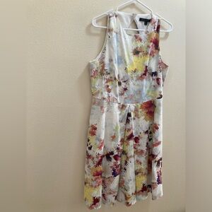 Cute colorful dress with lots of pretty details.